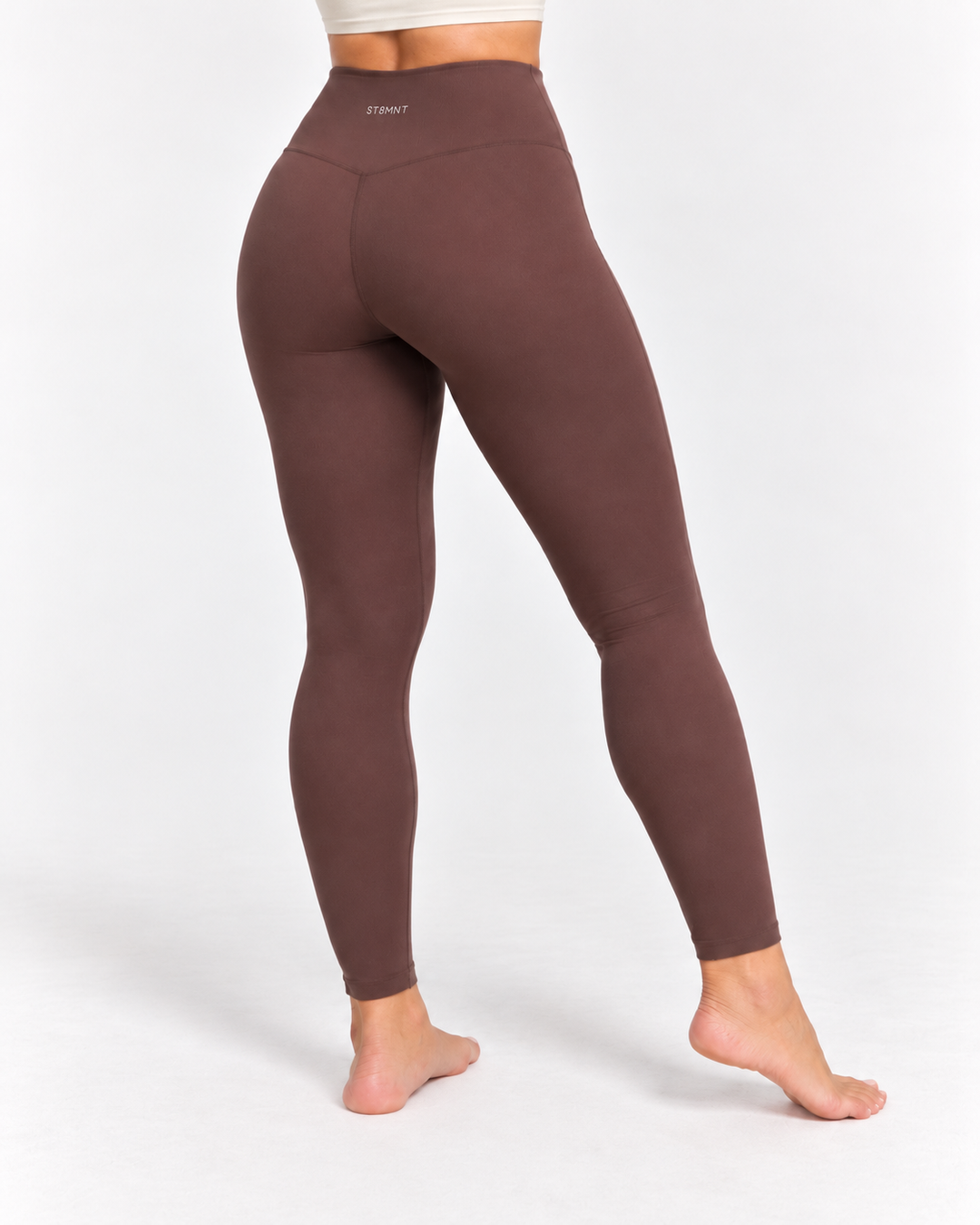Brun träningsleggings för dam framifrån – ST8MNT