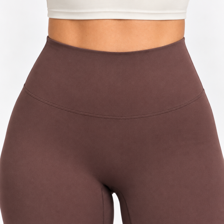 Brun träningsleggings för dam framifrån – ST8MNT