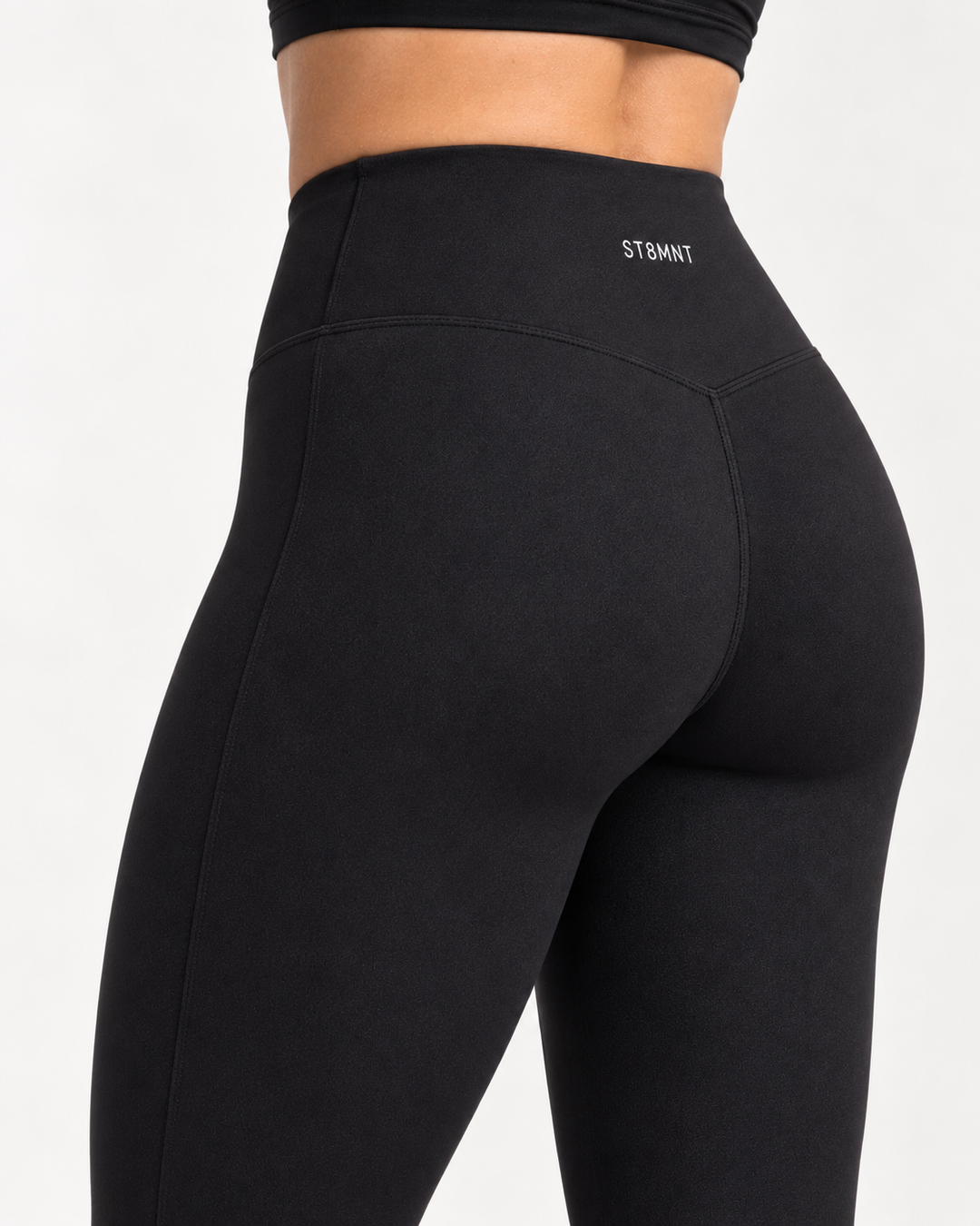 Svarta träningsleggings för dam bakifrån – ST8MNT
