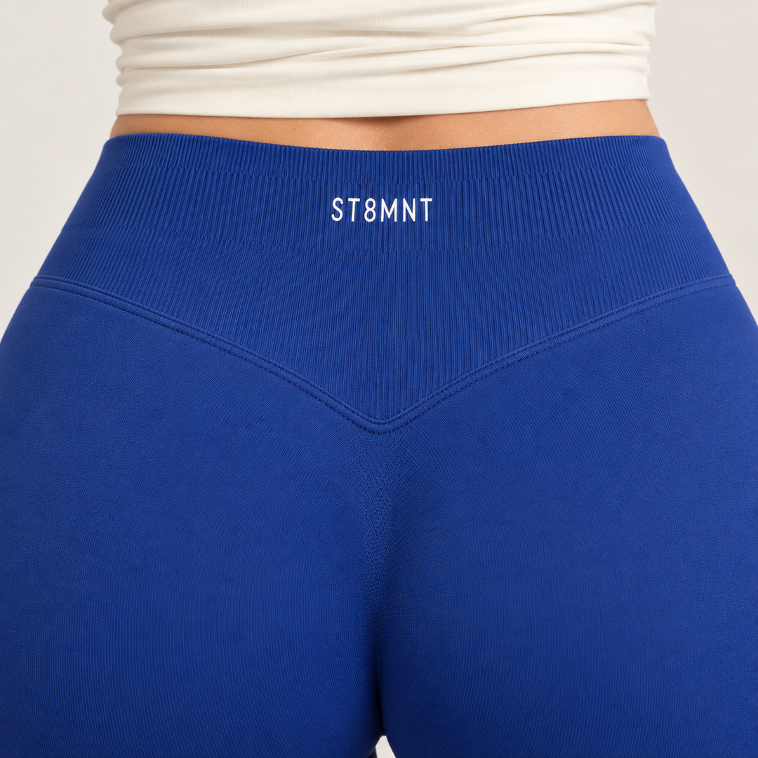 Blå träningsleggings för dam bakifrån – ST8MNT