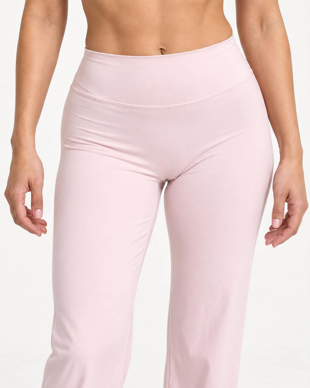 Detaljbild av rosa wide leg-byxor med hög midja – ST8MNT